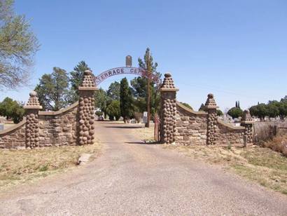 Post Tx -  Garza County Terrace Cemetery Entrance with round rock gate piers 