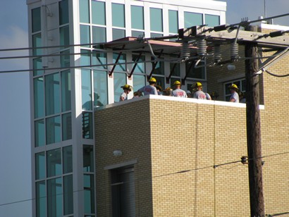 Frisco Texas firemen on the roof