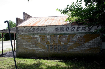 Sunglo Feeds ghost sign in Midway, Texas